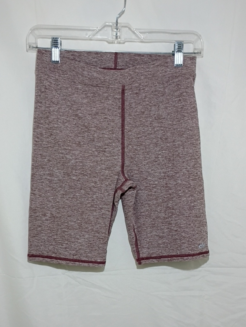 ALO Yoga heathered mauve-pink biker shorts